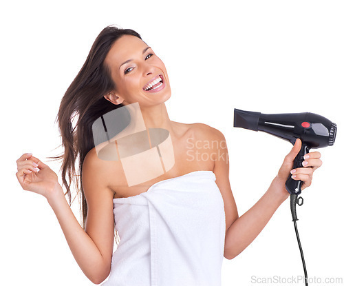 Image of Woman, portrait and blow dryer or haircare in studio with salon tool with towel for morning routine, white background or style. Female person, equipment and heat for beauty, texture or mockup space