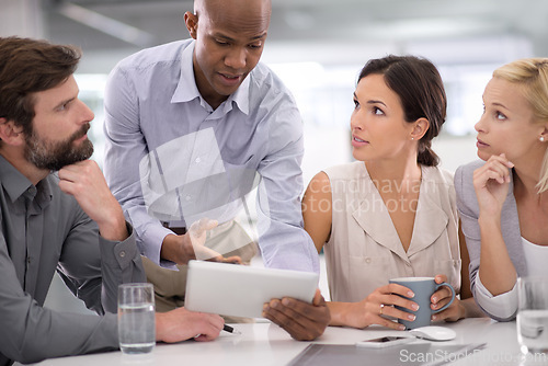 Image of Business people, teamwork and tablet for research in meeting with speaker for corporate planning, brainstorming or diversity. Collaboration, group and employees with technology and discussion at work