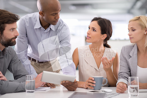 Image of Business people, collaboration and tablet for research in meeting with speaker for corporate planning, brainstorming or diversity. Teamwork, group and employees with technology and discussion at work