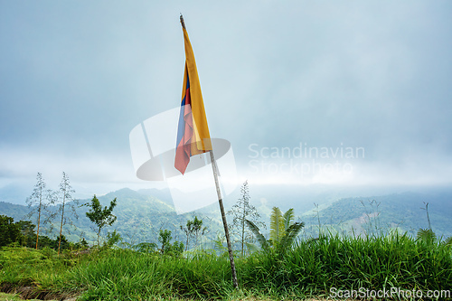 Image of Landscape of Sierra Nevada mountains with colombian flag, Colombia wilderness landscape.