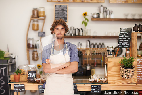 Image of Portrait, welcome and man with confidence in restaurant for service with happy small business owner. Local coffee shop, cafe or bistro manager with smile, hospitality or entrepreneur at startup store