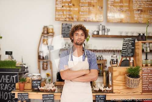 Image of Portrait, welcome and man with confidence in cafe for service with happy small business owner. Local coffee shop, restaurant or bistro manager with smile, hospitality or entrepreneur at startup deli.