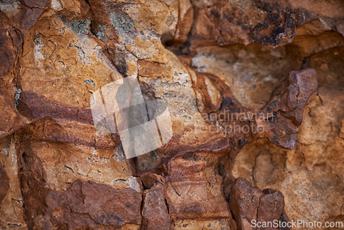 Image of Rock face, closeup and mountain in nature, natural or travel outdoor with wall. Cliff, stone and environment for bouldering, climbing and texture of surface in summer on a background in South Africa