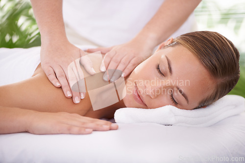 Image of Spa, face and woman or hands with massage for relax, luxury treatment and satisfaction with towel. Person, calm and masseuse for body care, pain relief and comfort with smile, wellness and skincare