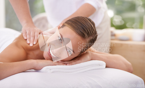 Image of Smile, portrait and woman or hands with massage for relax, luxury treatment and happiness with towel. Person, face and masseuse for body care, pain relief and comfort with spa, wellness and skincare