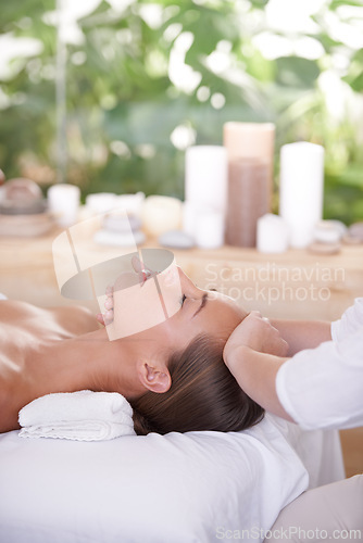 Image of Spa, head and woman or hands with massage for relax, luxury treatment and satisfaction with towel. Person, face and masseuse for body care, pain relief and comfort with calm, wellness and skincare