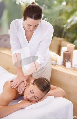 Image of Spa, woman and masseuse with massage for relax, luxury treatment and satisfaction with towel outdoor. Person, face and wellbeing for body care, pain relief and comfort with wellness and skincare