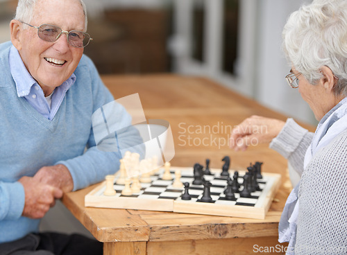 Image of Happy, couple and senior in game of chess together to relax in retirement on holiday or vacation. Elderly, man of woman outdoor with smile for winning competition, checkmate or activity with strategy