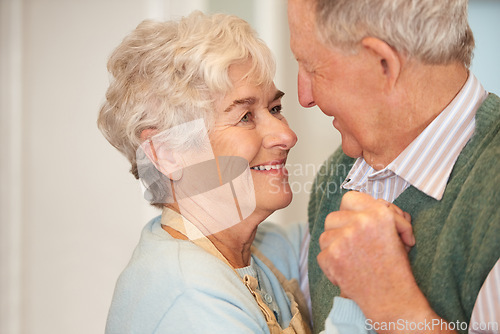 Image of Elderly, couple and happy with dancing in home for bonding, support and holding hands with romance. Senior, man and woman with hug, embrace and smile for relationship, dancer and love with affection