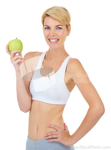 Image of Woman, portrait and apple in studio for fitness, wellness or diet on white background, mockup or backdrop. Model, dietician or nutritionist with green fruit for cleanse, vitamins and workout