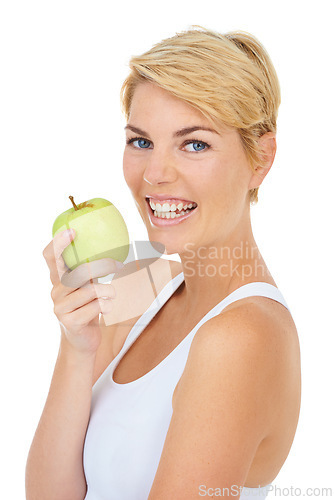 Image of Fitness model, portrait and health with apple for studio wellness, diet and by white background, mockup or backdrop. Woman, dietician and nutritionist with fruit for breakfast food, vitamins or detox