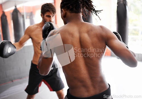 Image of Men, kickboxing and ready for fight in gym, fitness and topless for exercise and workout. People, bodybuilders and performance for challenge or practice, train and serious for competition in sports