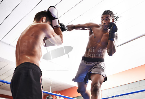 Image of Men, kickboxing and jumping for fight in ring, fitness and topless for exercise and workout. People, bodybuilders and performance for challenge or practice, train and combat for competition in sports