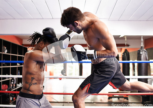 Image of Men, kickboxing and jumping for match in ring, fitness and topless for exercise and workout. People, bodybuilders and performance for challenge or practice, train and combat for competition in sports