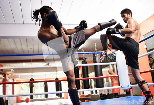 Image of Men, kickboxing and performance for fight in ring, fitness and topless for exercise and workout. People, action and practice for challenge or match, training and combat for competition in sports