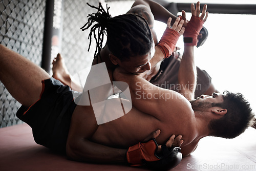 Image of Fight, wrestling and men on floor for kickboxing competition, challenge and fitness with sports in gym. Match, strong fighter and resilience in exercise, sparring practice or power in battle together