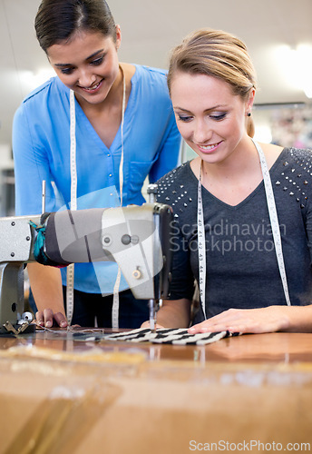 Image of Designers, collaboration and sewing for planning on fashion, coworkers and tailor on fabric. Women, teamwork and support on textile in clothing business, manufacturing and partnership on style