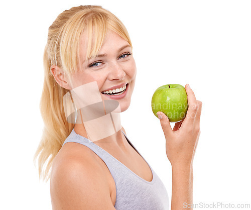 Image of Studio, portrait and woman with apple for health, vegan and nutrition benefits for wellness. Fruit, face and happy female person with food for vitamin c, detox and clean gut on white background