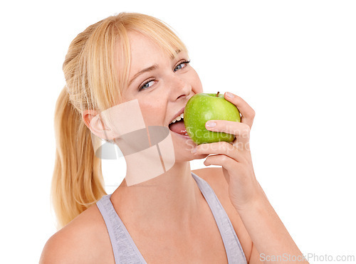 Image of Studio, portrait and happy woman with apple for gut health, diet and nutrition benefits on white background. Food, face and female person eating fruit with vitamin c, vegan and detox for wellness