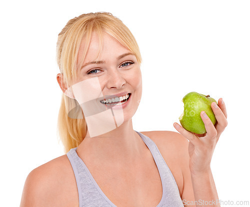 Image of Portrait, studio and happy woman with apple for diet, benefits or food to lose weight. Healthy eating, nutrition and face of girl with fruit for body wellness, digestion and smile on white background