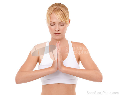 Image of Woman, yoga and meditation or namaste in studio for exercise, healthy body and wellness with fitness and zen. Pilates, person and face or warm up with sportswear for mindfulness on white background