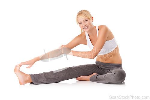 Image of Woman, portrait and leg stretching in studio for flexibility practice for workout warm up or yoga, wellness or white background. Female person, arm and foot for mobility training, pilates or mockup