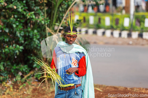 Image of Vendors in Bahir Dar sell handcrafted grass headbands, a symbol of Easter celebrations. Ethiopia