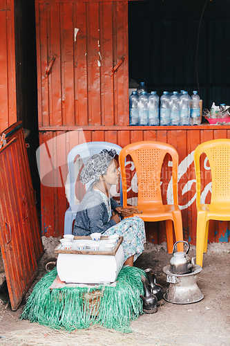 Image of Ethiopian traditional Coffee ceremony, crafting street bunna coffee, Adis Zemen Etiopia