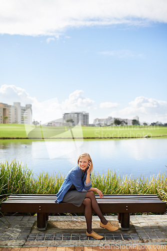 Image of Lake, park and woman on bench on a phone call for communication, social networking and chat. Relax, city and happy person with smartphone for talking, conversation and speaking outdoors on weekend