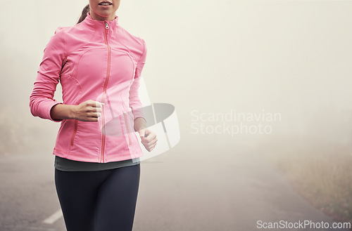 Image of Fog, fitness and person running on road outdoor for healthy body, wellness and training for sports on mockup space in winter. Mist, exercise and athlete workout for cardio, race or energy in nature