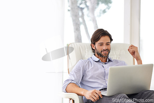 Image of Businessman, relax and sofa with laptop online for remote work, living room and home office for freelance job. Male person, social media and browsing or research on computer, couch and smile