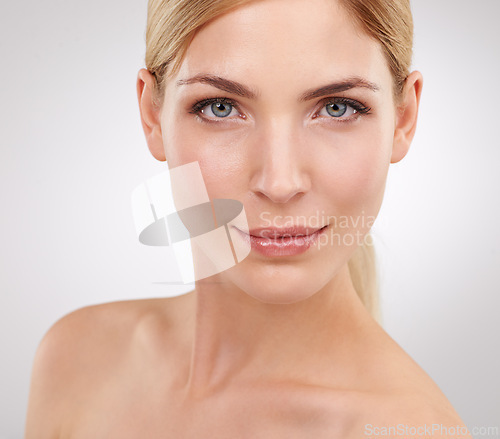 Image of Beauty, cosmetics and portrait of woman with luxury care, confidence and natural facial in studio. Dermatology, healthy skin and face of girl on white background with skincare, glow and wellness.