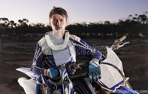 Image of Sport, portrait and man with off road motorbike, confidence and gear for competition, race or challenge. Adventure, adrenaline and serious face of athlete on extreme course with dirt bike in evening