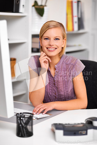 Image of Computer, smile and portrait of woman in office typing for online email for corporate appointment. Happy, technology and young female receptionist working on project with desktop by desk in workplace