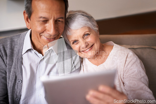 Image of Senior, couple and portrait with tablet on sofa for online bingo, crossword puzzle and internet games with smile. Elderly, man and woman with face and happiness with technology for web news in home