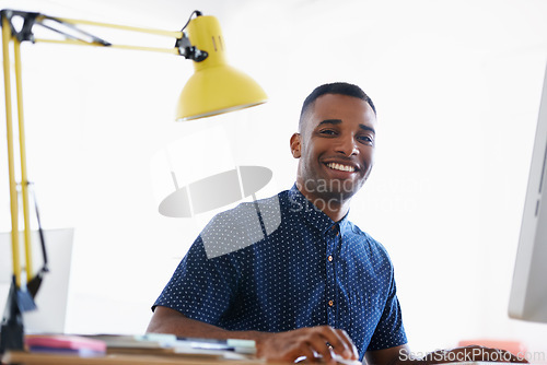 Image of Creative, coworking space and portrait of black man with smile at desk for networking on project in happy office. Relax, face or professional designer with lamp, research and architecture business.