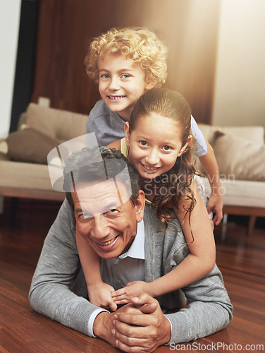 Image of Portrait, home and grandfather on the ground, grandchildren and happiness with siblings or vacation. Face, apartment or elderly man with grandkids or bonding together with fun or playing with holiday