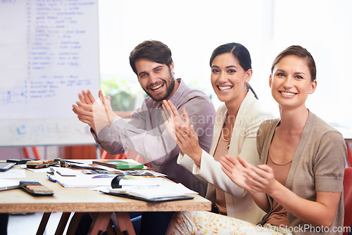 Image of Colleagues, portrait and applause with happiness for success, growth and achievements for team at staff meeting. Business, people and clapping for good feedback, targets and cheering for employees