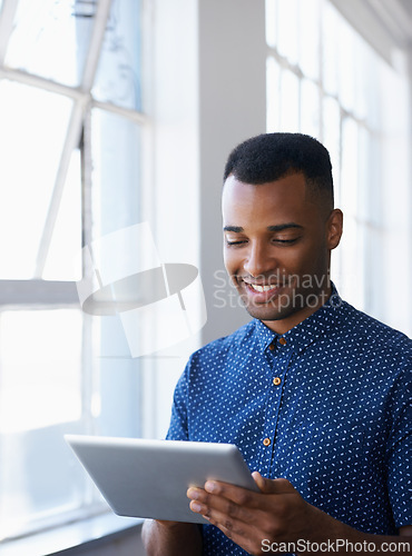 Image of Businessman, tablet and online at window for networking, internet search and communication in office. Entrepreneur, african employee and happy with technology for corporate email and planning at work