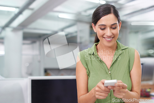 Image of Business woman, typing and networking on phone, smile and planning or communication in email. Female person, office and app for conversation on mockup space, web and internet for research or info