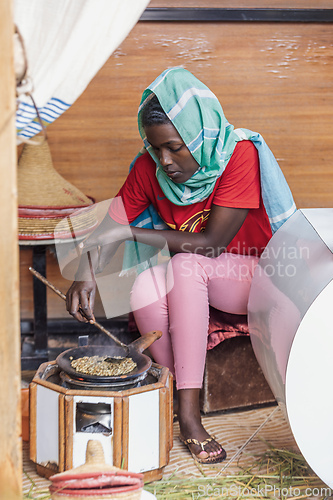 Image of Ethiopian traditional Coffee ceremony, crafting street bunna coffee, Ziway Etiopia