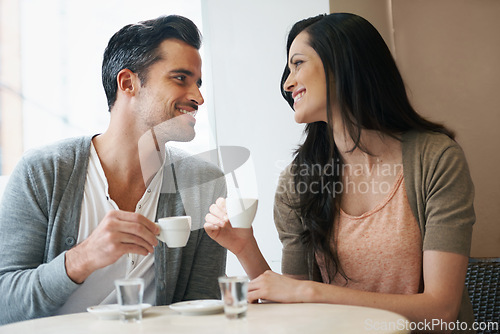 Image of Date, coffee and couple at cafe with relax, smile and together with love and hot drink at a table. Espresso, morning and happy marriage at a restaurant with bonding, care and romance at bistro
