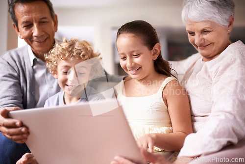 Image of Happy family, grandparents and children with laptop for communication, entertainment or research on sofa at home. Grandma, grandpa and kids smile on computer for online search or networking at house