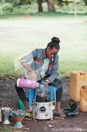 Image of Ethiopian traditional Coffee ceremony, crafting street bunna coffee, Southern Nations Etiopia