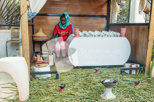 Image of Ethiopian traditional Coffee ceremony, crafting street bunna coffee, Ziway Etiopia
