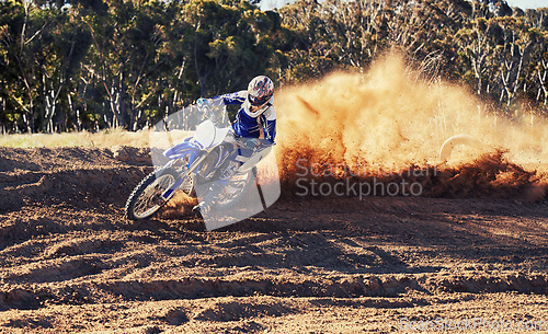 Image of Person, dirt bike and professional motorcyclist racing in extreme sports or competition on outdoor track. Expert rider on motorbike or scrambler for sand course, challenge or off road rally in nature