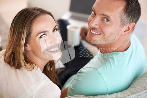 Image of Happy couple, smile and portrait with love in home, romantic and commitment with care in marriage. Man, woman and excited face for bonding in apartment, weekend and coffee on couch for online movies