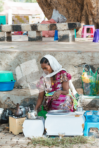 Image of Ethiopian traditional Coffee ceremony, crafting street bunna coffee, Aksum Etiopia