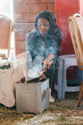 Image of Ethiopian traditional Coffee ceremony, crafting street bunna coffee, Adigrat Mazegaja Bet Etiopia