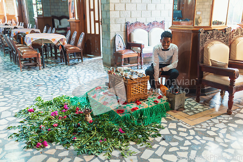 Image of Ethiopian traditional Coffee ceremony, crafting street bunna coffee, Maqale Etiopia